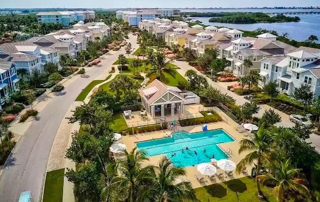 311 Compass Point Dr Unit 101, Bradenton, FL 34209 - aerial view of a pool and a large body of water