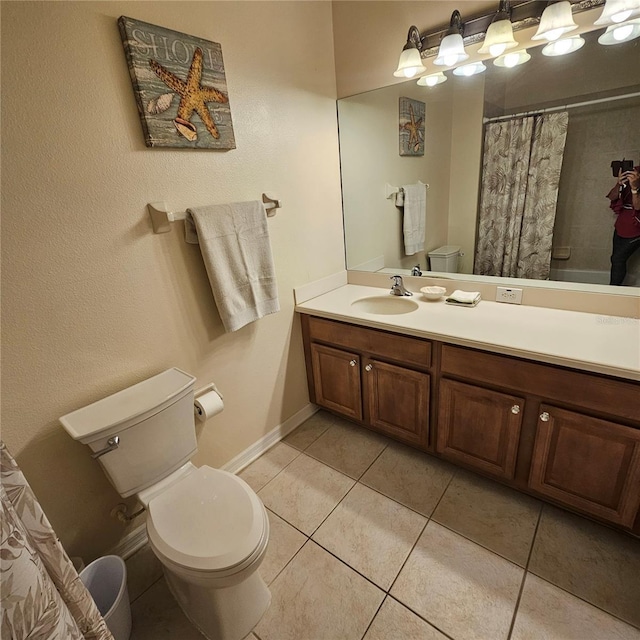8110 Villa Grande Ct, Sarasota, FL 34243 - bathroom featuring toilet, tile patterned floors, vanity, a shower with curtain, and baseboards