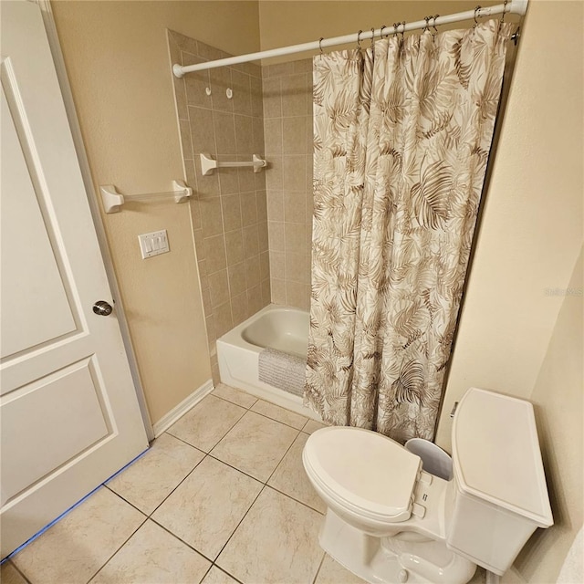 8110 Villa Grande Ct, Sarasota, FL 34243 - bathroom with tile patterned flooring, toilet, shower / bathtub combination with curtain, and baseboards