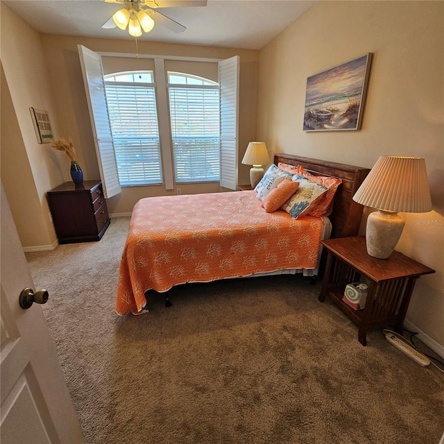 8110 Villa Grande Ct, Sarasota, FL 34243 - carpeted bedroom featuring a ceiling fan and baseboards