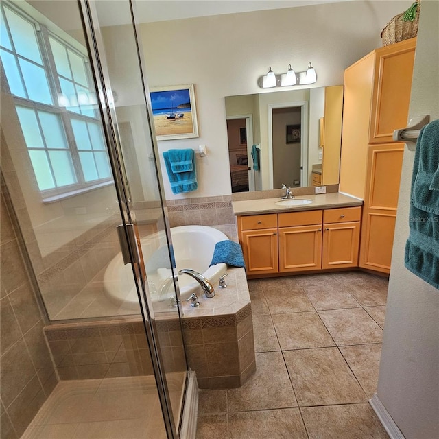 8110 Villa Grande Ct, Sarasota, FL 34243 - full bathroom featuring a bath, a stall shower, vanity, and tile patterned floors