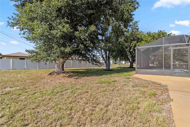 3239 Daytona Dr, Punta Gorda, FL 33983 - view of yard with glass enclosure