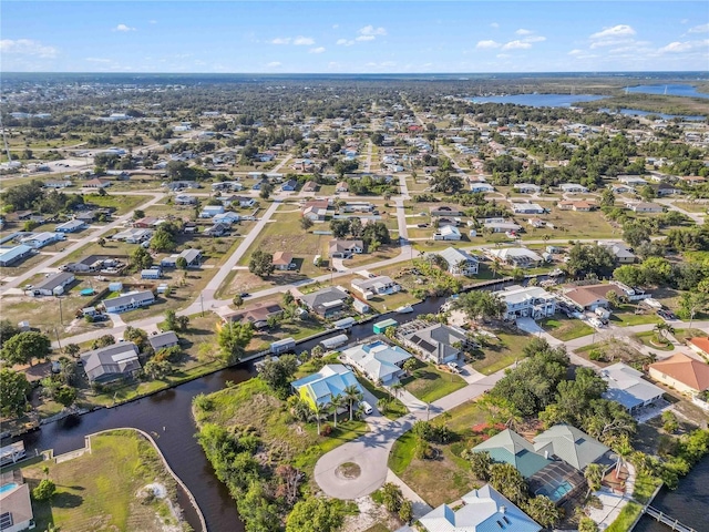 3239 Daytona Dr, Punta Gorda, FL 33983 - aerial view of property and surrounding area with nearby suburban area and a large body of water