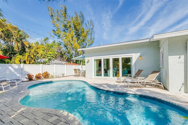 112 Palm Ave, Anna Maria, FL 34216 - view of pool with french doors and a patio area