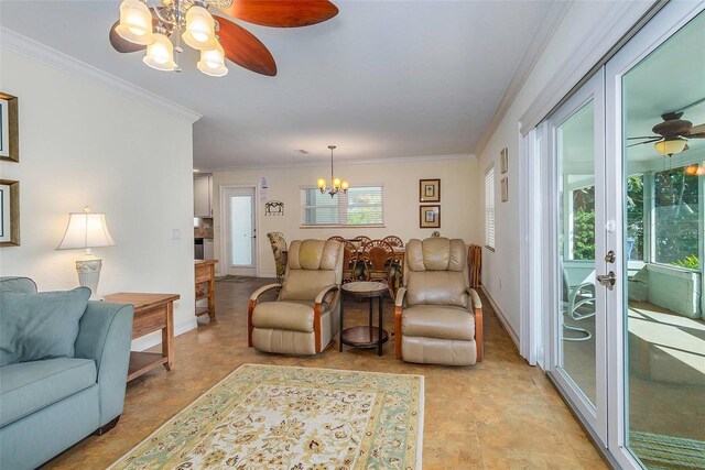 112 Palm Ave, Anna Maria, FL 34216 - living area featuring a chandelier, ornamental molding, baseboards, and ceiling fan
