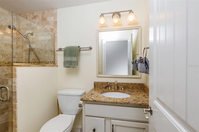 112 Palm Ave, Anna Maria, FL 34216 - bathroom with vanity, a tile shower, and toilet