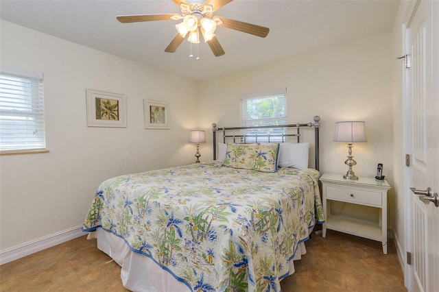 112 Palm Ave, Anna Maria, FL 34216 - bedroom with baseboards and a ceiling fan