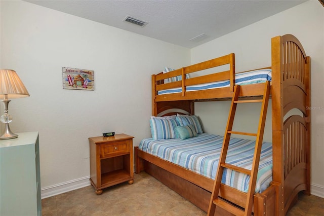 112 Palm Ave, Anna Maria, FL 34216 - bedroom featuring baseboards