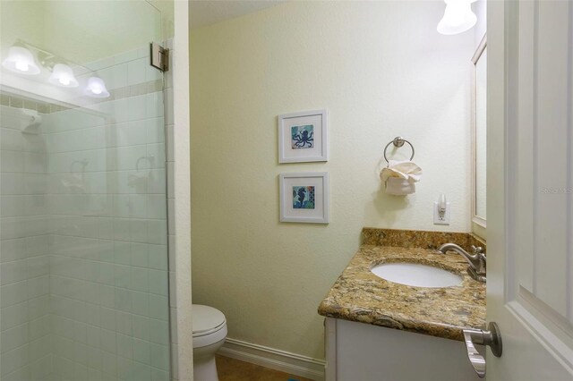 112 Palm Ave, Anna Maria, FL 34216 - full bath with vanity, toilet, and tiled shower