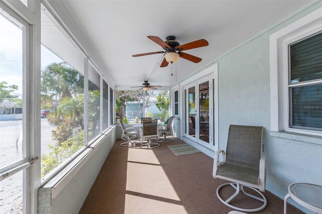 112 Palm Ave, Anna Maria, FL 34216 - sunroom / solarium featuring ceiling fan and carpet flooring