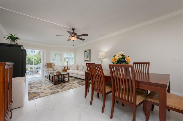 1350 N Portofino Dr Unit 208, Sarasota, FL 34242 - dining area featuring a ceiling fan, ornamental molding, and light marble finish floors