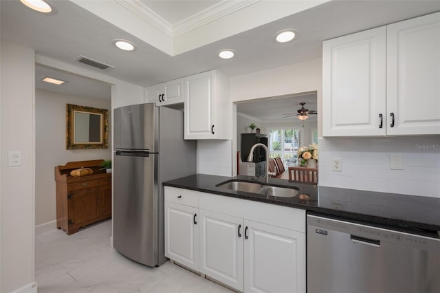 1350 N Portofino Dr Unit 208, Sarasota, FL 34242 - kitchen featuring stainless steel appliances, crown molding, a sink, recessed lighting, and backsplash