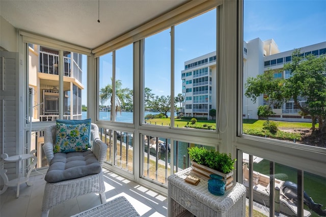 1350 N Portofino Dr Unit 208, Sarasota, FL 34242 - sunroom with a water view