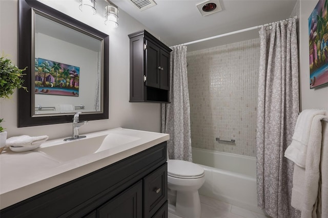 1350 N Portofino Dr Unit 208, Sarasota, FL 34242 - full bathroom featuring toilet, vanity, and shower / bath combination with curtain