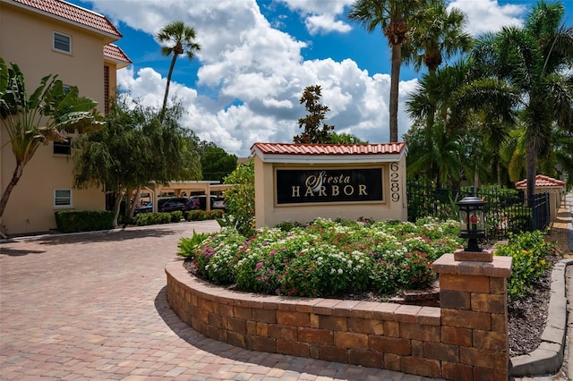1350 N Portofino Dr Unit 208, Sarasota, FL 34242 - community sign with fence and driveway