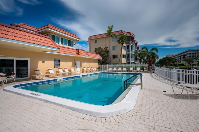 1350 N Portofino Dr Unit 208, Sarasota, FL 34242 - community pool with fence and a patio area