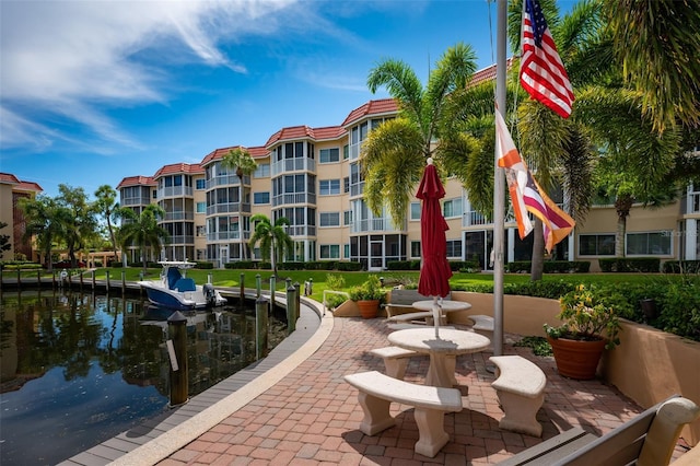 1350 N Portofino Dr Unit 208, Sarasota, FL 34242 - view of community featuring a dock