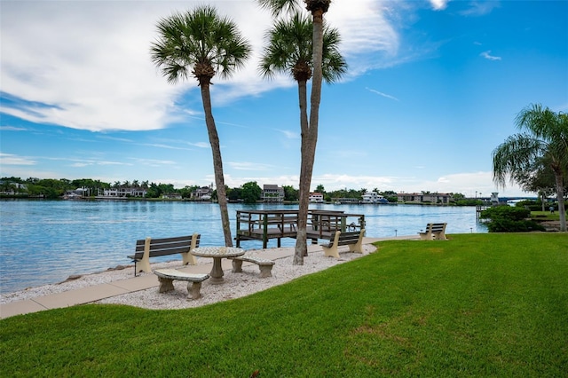 1350 N Portofino Dr Unit 208, Sarasota, FL 34242 - dock featuring a lawn and a water view