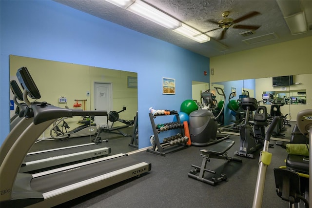 1350 N Portofino Dr Unit 208, Sarasota, FL 34242 - gym featuring a textured ceiling