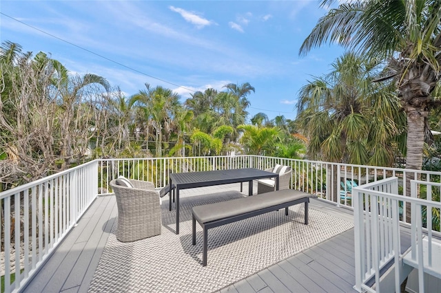 120 White Ave, Anna Maria, FL 34216 - wooden deck featuring outdoor dining space