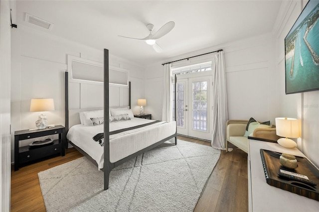 120 White Ave, Anna Maria, FL 34216 - bedroom featuring access to outside, wood finished floors, and a ceiling fan