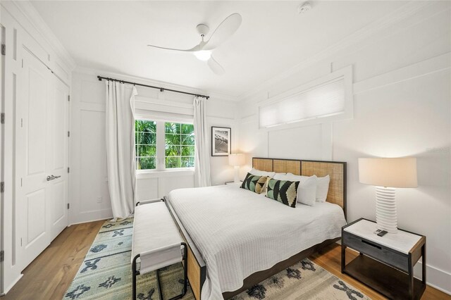 120 White Ave, Anna Maria, FL 34216 - bedroom featuring crown molding, wood finished floors, and ceiling fan