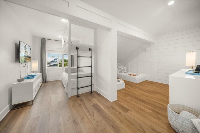 120 White Ave, Anna Maria, FL 34216 - ensuite bathroom with wood finished floors, recessed lighting, and baseboards