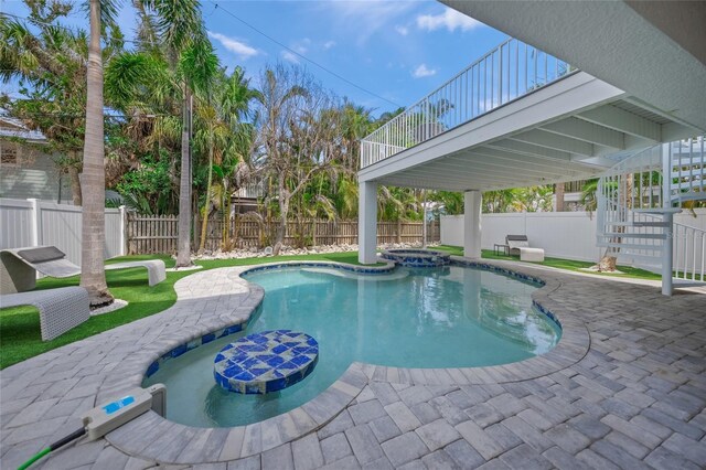 120 White Ave, Anna Maria, FL 34216 - view of swimming pool featuring a fenced backyard, a pool with connected hot tub, a patio, and stairs