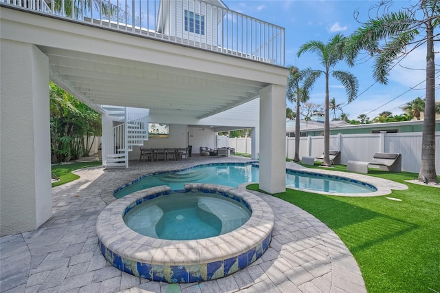 120 White Ave, Anna Maria, FL 34216 - view of pool featuring stairway, a patio area, and a pool with connected hot tub