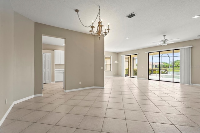 8118 Stirling Falls Cir, Sarasota, FL 34243 - spare room featuring a chandelier, light tile patterned flooring, recessed lighting, ceiling fan, and a textured ceiling