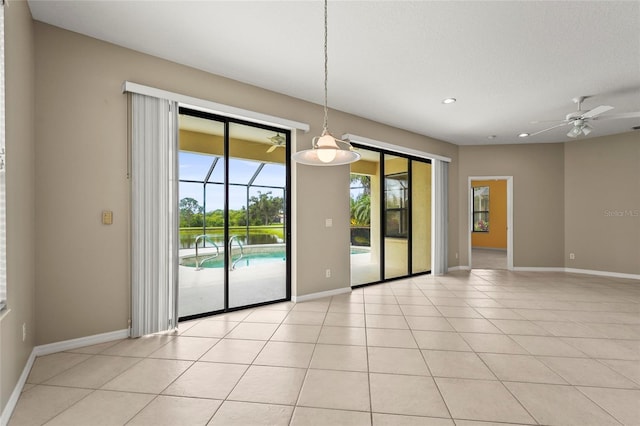 8118 Stirling Falls Cir, Sarasota, FL 34243 - spare room featuring recessed lighting, ceiling fan, light tile patterned floors, and a sunroom