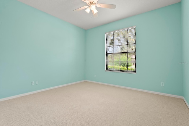 8118 Stirling Falls Cir, Sarasota, FL 34243 - carpeted spare room featuring baseboards and ceiling fan