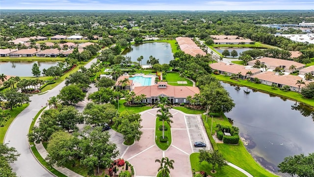 8118 Stirling Falls Cir, Sarasota, FL 34243 - aerial view of residential area featuring a nearby body of water and a pool area