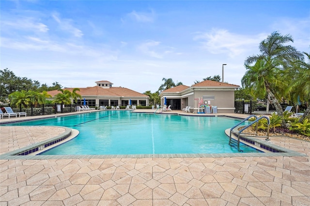 8118 Stirling Falls Cir, Sarasota, FL 34243 - community pool featuring a patio area