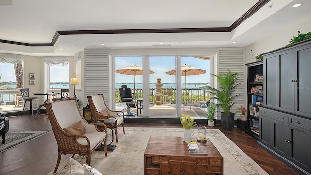 420 Golden Gate Pt Unit 200A, Sarasota, FL 34236 - sitting room with crown molding, dark wood-style flooring, and recessed lighting