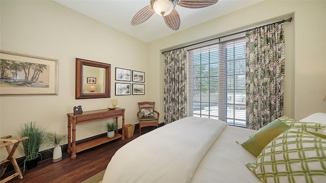 420 Golden Gate Pt Unit 200A, Sarasota, FL 34236 - bedroom featuring dark wood-style flooring and ceiling fan