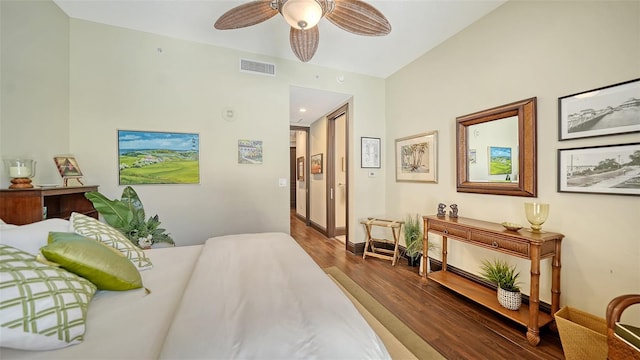 420 Golden Gate Pt Unit 200A, Sarasota, FL 34236 - bedroom featuring wood finished floors, a ceiling fan, and baseboards