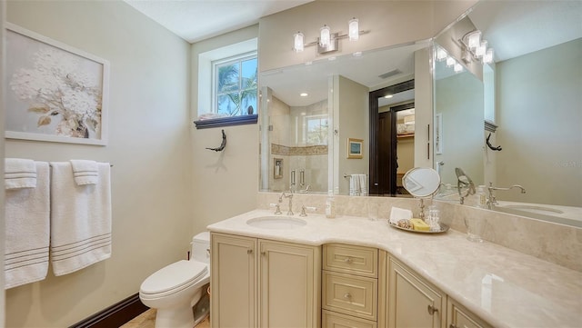 420 Golden Gate Pt Unit 200A, Sarasota, FL 34236 - full bathroom featuring a shower stall, toilet, and vanity
