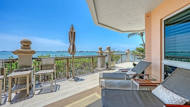 420 Golden Gate Pt Unit 200A, Sarasota, FL 34236 - balcony with a water view