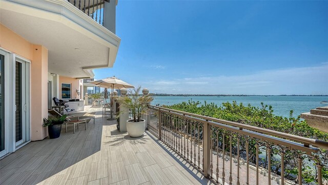 420 Golden Gate Pt Unit 200A, Sarasota, FL 34236 - balcony with a water view