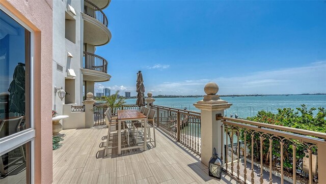 420 Golden Gate Pt Unit 200A, Sarasota, FL 34236 - deck featuring a water view