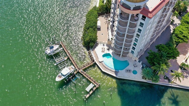 420 Golden Gate Pt Unit 200A, Sarasota, FL 34236 - drone / aerial view of a pool and a large body of water