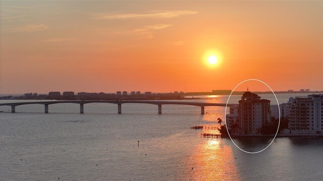 420 Golden Gate Pt Unit 200A, Sarasota, FL 34236 - water view with a notable bridge and nearby urban area