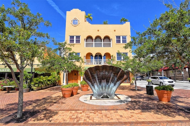 420 Golden Gate Pt Unit 200A, Sarasota, FL 34236 - view of front facade featuring stucco siding