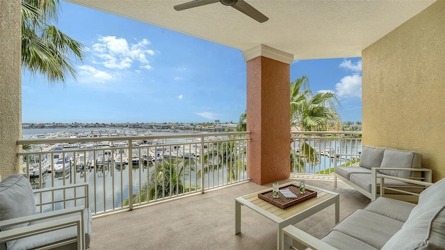 606 Riviera Dunes Way Unit 306, Palmetto, FL 34221 - balcony with a water view, ceiling fan, and an outdoor living space