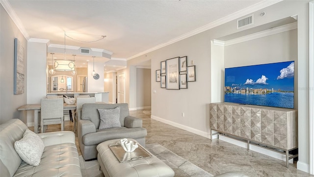 606 Riviera Dunes Way Unit 306, Palmetto, FL 34221 - living room featuring crown molding and baseboards
