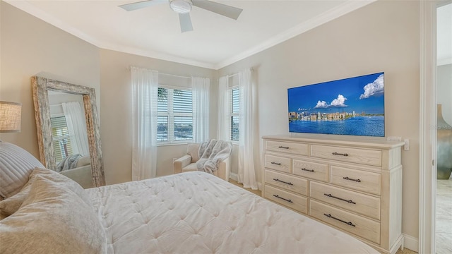 606 Riviera Dunes Way Unit 306, Palmetto, FL 34221 - bedroom with crown molding, baseboards, and ceiling fan