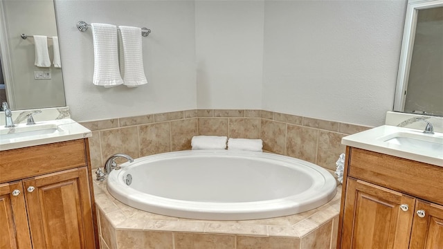 606 Riviera Dunes Way Unit 306, Palmetto, FL 34221 - bathroom with two vanities and a bath