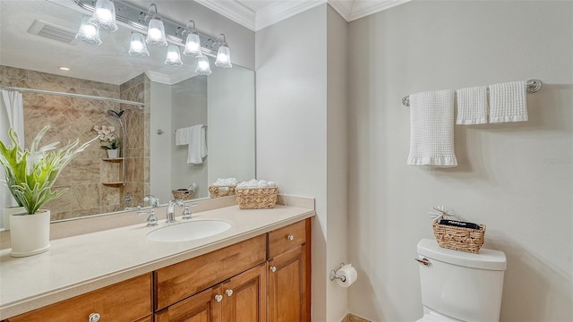 606 Riviera Dunes Way Unit 306, Palmetto, FL 34221 - bathroom featuring crown molding, toilet, vanity, and tiled shower