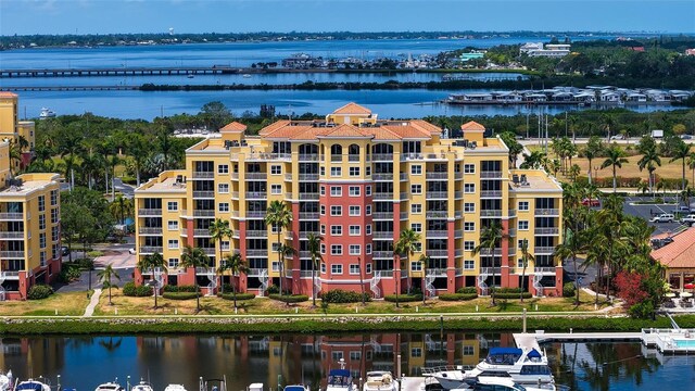 606 Riviera Dunes Way Unit 306, Palmetto, FL 34221 - view of apartment building / complex with a water view